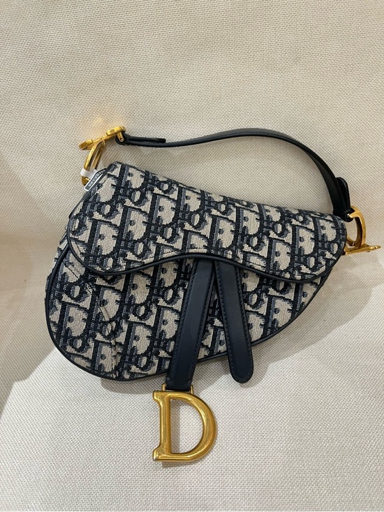 Dior Handbags - Like New Dior Navy & Ivory Oblique Mini Saddle Bag with Gold 'D' Charm 2020
